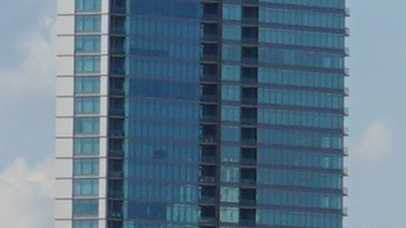 Fifth and West Residences on the downtown Austin skyline