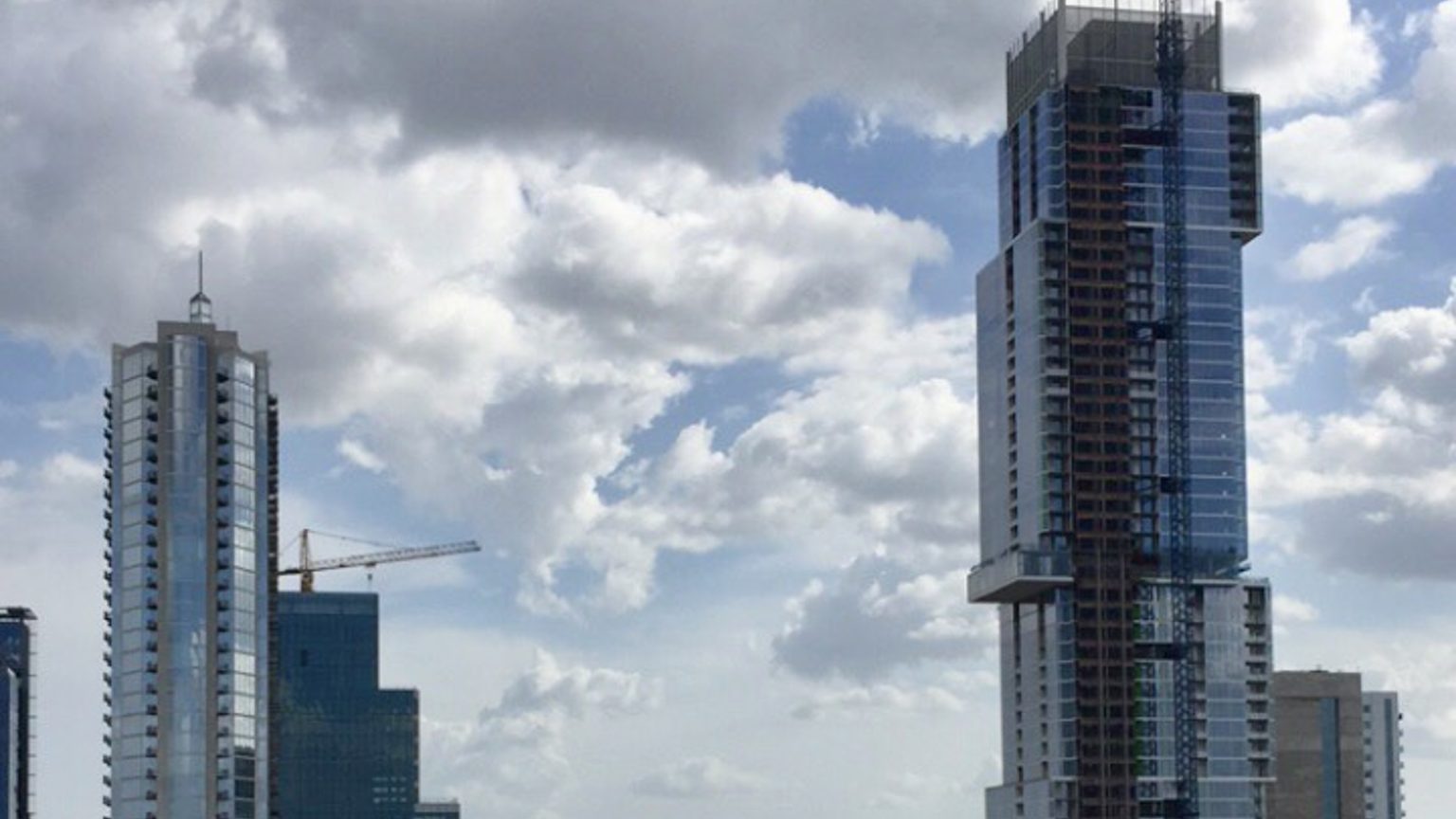 Austin skyline with construction cranes over new towers